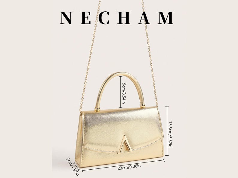 May include: Gold-colored handbag with a top handle and chain strap. The bag is rectangular, measuring 9.06 inches wide, 5.32 inches high, and 1.97 inches deep. The bag has a gold-colored metal clasp and the word "NECHAM" is at the top.