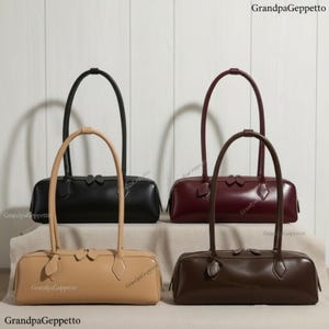 May include: Four structured rectangular handbags with dual top handles and zipper closures. The bags are displayed in black, burgundy, beige, and dark brown colors. Each bag features a smooth finish and the text GrandpaGeppetto is visible.
