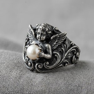 Engel Perlenring silber Engel Flügel Flügel filigrane Statement Band