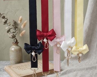 Coquettestrik telefoonkoord, satijnen lint crossbodyriem, balletcore camerakoord, schattig parelhandvat, verstelbare pastelkleurige nekriem