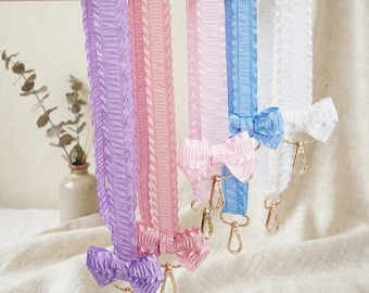 Telefoonkoord met strik, verstelbare schouderband voor je telefoon, schattig telefoonkoord met lint voor vrouwen, dun koord met textuur voor telefoon, sleutels en camera