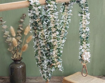 Groene telefoonkoord met bloemenprint, verstelbare schouderband voor telefoon, sleutels, camera of klein tasje, met parelbloemmotief.