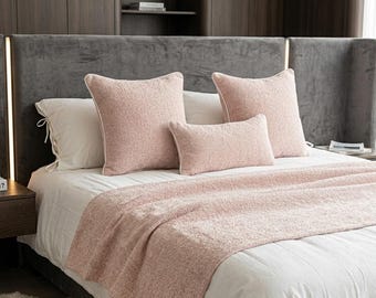 Blush pink textured bouclé bedding set including throw and cushion covers