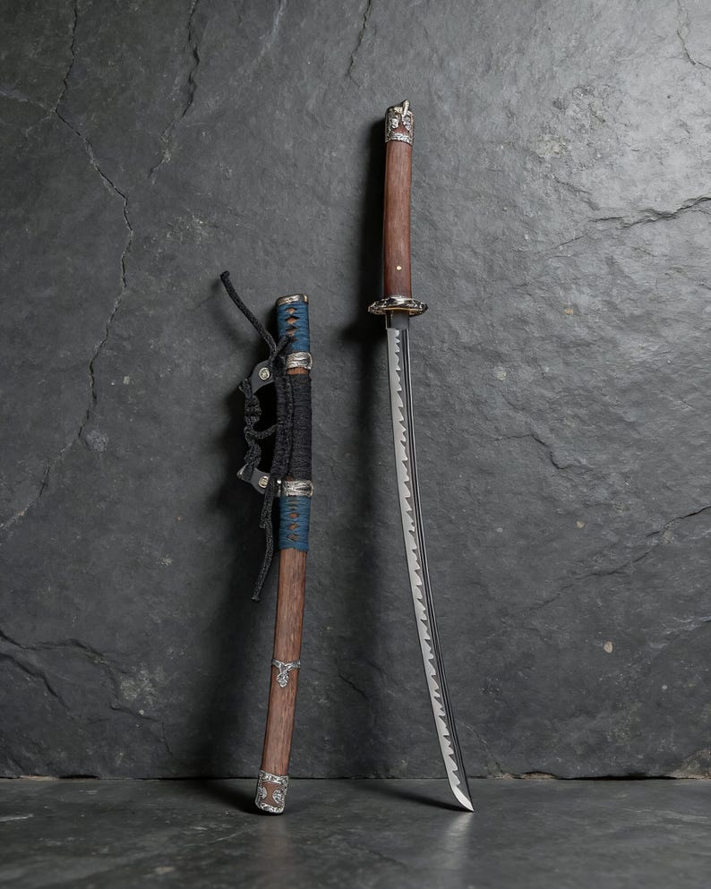 May include: A Japanese katana sword with a wooden handle and a silver-coloured guard. The blade is silver and has a curved edge. The scabbard is brown with blue and black accents.