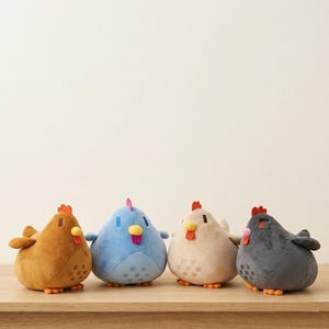 May include: Four plush chicken toys in shades of brown, blue, beige, and gray, each with a red comb and yellow beak. The chickens are sitting on a wooden surface.