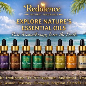 May include: An advertisement for Redolence essential oils. The image features eight small amber glass bottles with gold caps, each labeled with a different essential oil name. The background shows a beach scene with palm trees and the text "Explore Nature's Essential Oils."