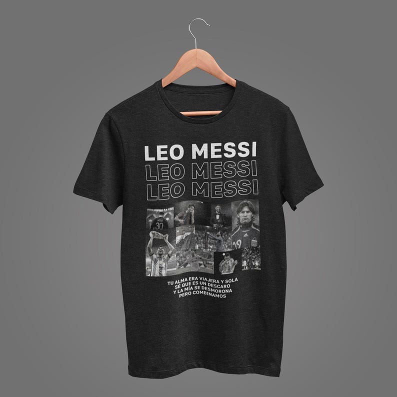 A black t-shirt with a graphic design featuring the text "LEO MESSI" and multiple images of the same person, likely a soccer player.