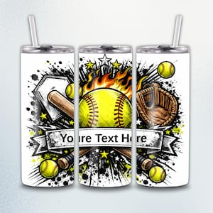 May include: A cylindrical tumbler with a straw featuring a softball graphic, a brown baseball glove, a wooden bat, a home plate, and orange flames. A white banner across the center displays the black text "Your Text Here" amidst black paint splatters.