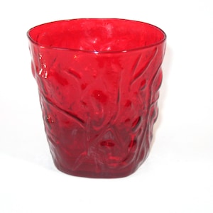 May include: A set of three ceramic mugs with a speckled, matte finish. The mugs are in shades of cream, light gray, and dark gray. Each mug has a simple, minimalist design, perfect for coffee or tea.