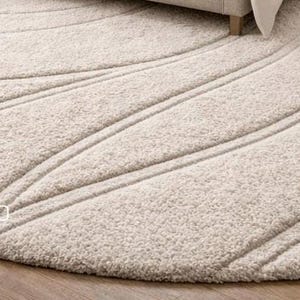 Modern round wool rug elegant neutral interior aesthetic design