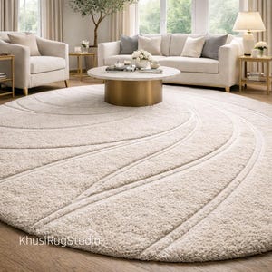 Cream round area rug soft plush cut pile texture close up detail
