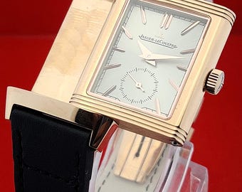 Reloj vintage Jaeger-LeCoultre Reverso con esfera gris y oro rosa, segundero pequeño y manual