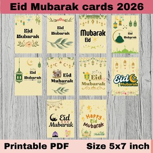Pode incluir: Um conjunto de cartões de felicitações Eid Mubarak em creme com vários designs, incluindo lanternas, luas crescentes e detalhes florais. Os cartões apresentam o texto "Eid Mubarak" em diferentes estilos. Os cartões medem 12.7 x 17.78 cm.