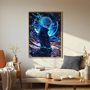 May include: Framed art print featuring a character with white hair and a blindfold, set against a backdrop of swirling blue and black energy. The artwork has a dynamic composition with vibrant colors and a detailed illustration style. The frame is a light brown color.