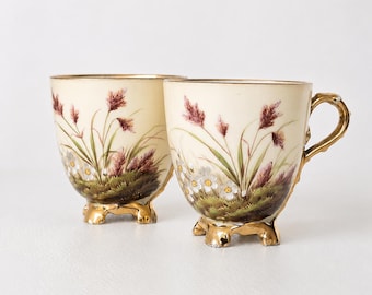 Pair Antique Dalovice Art Nouveau Secession Footed Porcelain Cups c.1890 – Hand-Painted Wildflowers, Gilt Bohemian Moka Cups