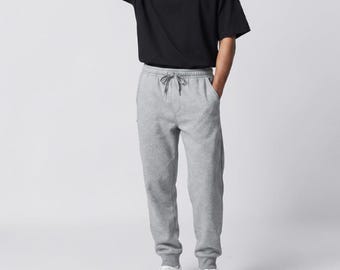 Pantalones deportivos casuales para hombre, pantalones deportivos informales con cordón ajustable, pantalones para gimnasio, entrenamiento y correr, pantalones de estilo urbano cómodos y de corte relajado.