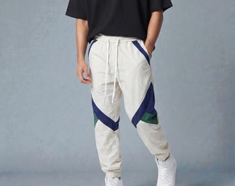 Pantalones harem patchwork para hombre, joggers deportivos ligeros de estilo urbano, pantalones holgados informales de verano.