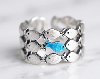 Blue Fish Against the Current Ring