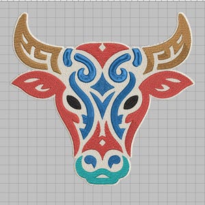 May include: Embroidered bull head design featuring a cream-colored base with red, blue, brown, and teal accents. The bull's head has a detailed, symmetrical pattern with curved lines and shapes, perfect for a patch or applique.