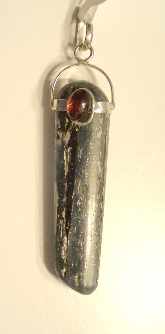 Polished Kyanite Pendant with garnet and silver be