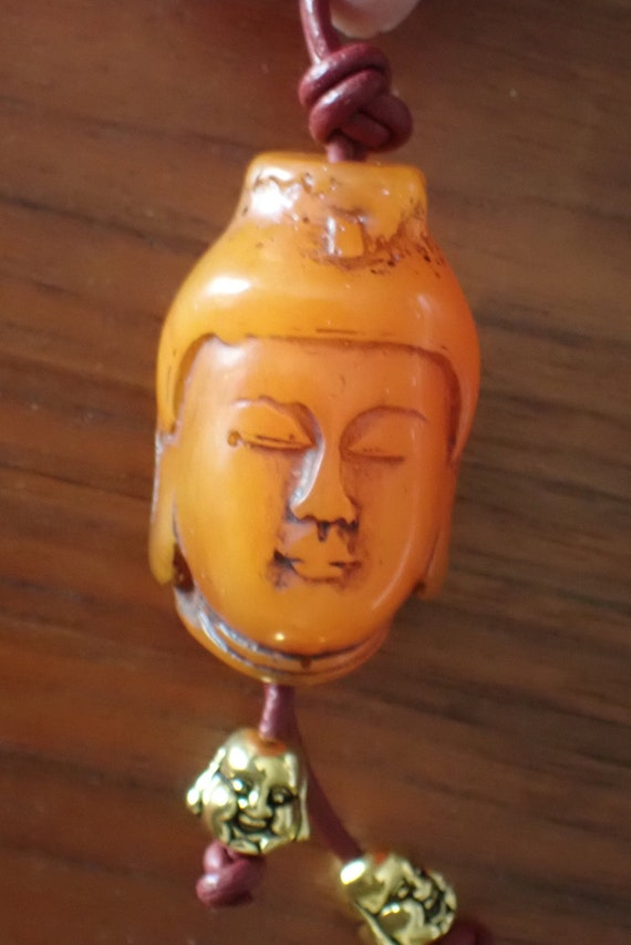 Buddha Head Pendant on Leather