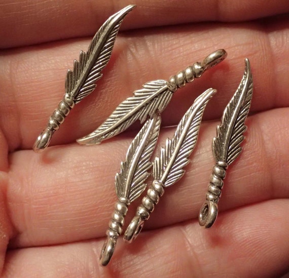 One Small Sterling Feather charm / pendant - image 1