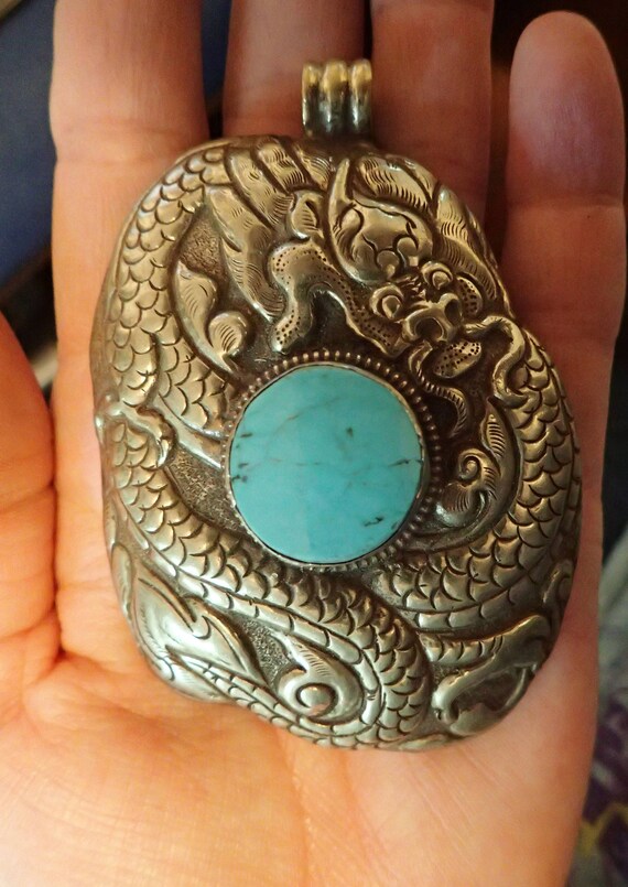 Vintage Tibetan Silver Repousse Dragon with turquoise Pendant. | Etsy