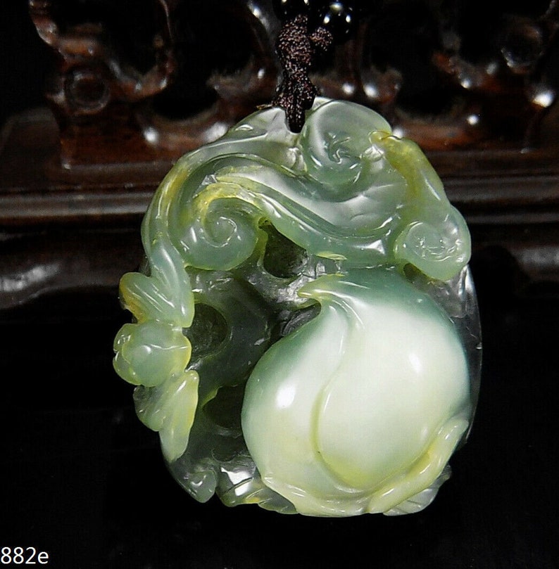 Peach Bat and Ruyi Jade carved Pendant with jadite beaded cord