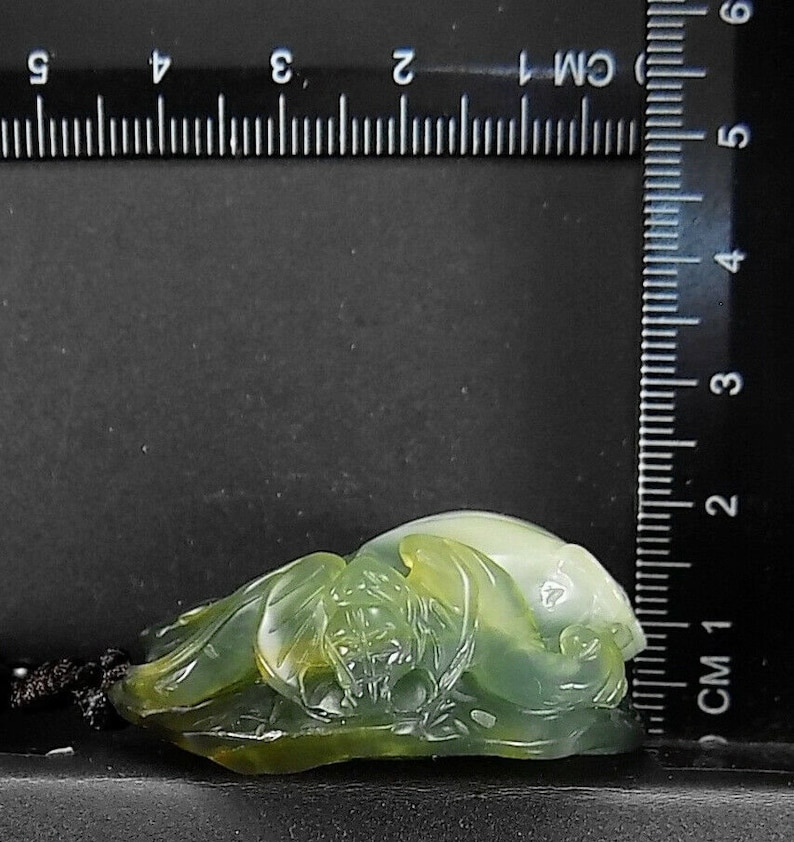 Peach Bat and Ruyi Jade carved Pendant with jadite beaded cord