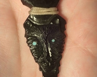 Carved jet Arrowhead with Eagle or Bobcat Pendant