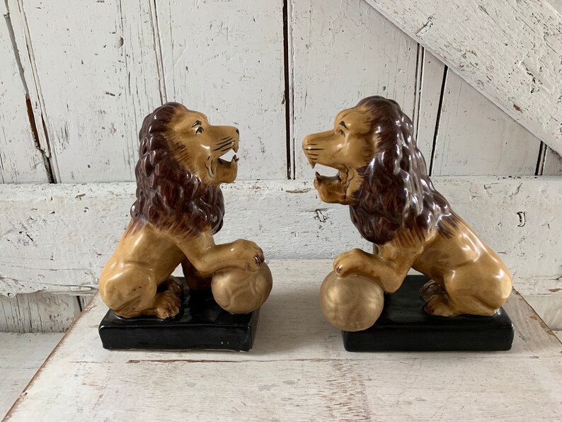 Lion bookends ceramic set of lions with hands on ball vintage