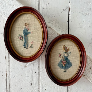 Oval wood frame Pair needlework boy girl in a vintage 7 x 9 inch frame