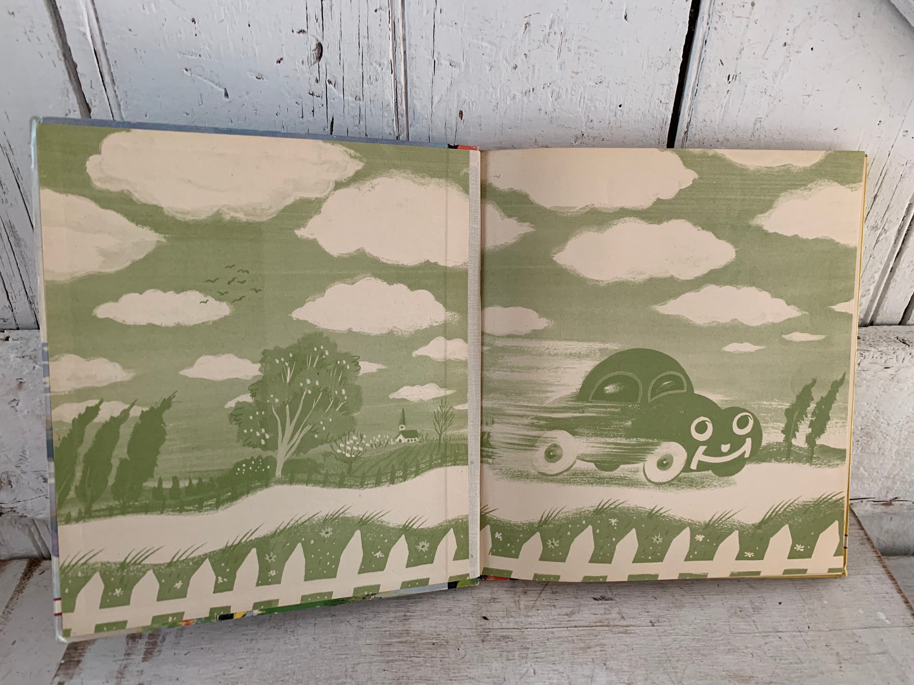 The Little Green Car Hardcover January 1, 1946 by Caroline Emerson