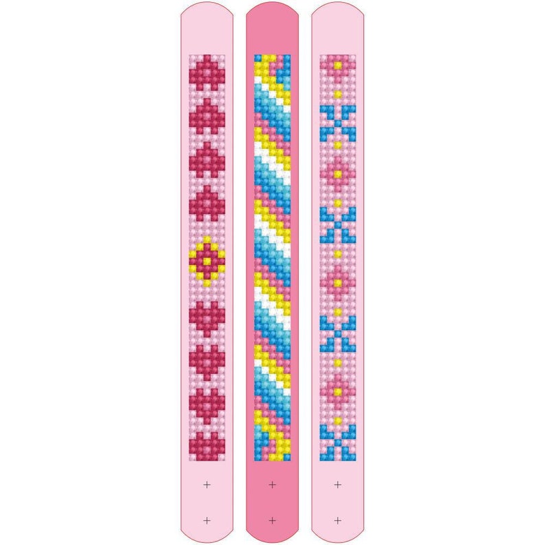 May include: Three pink plastic bracelets with different colorful patterns. The patterns include pink, blue, yellow, and white.