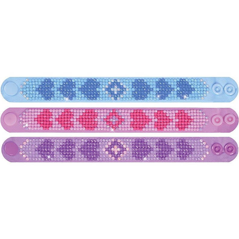 May include: Three colorful bracelets with a beaded design. The bracelets are blue, pink, and purple with a geometric pattern.