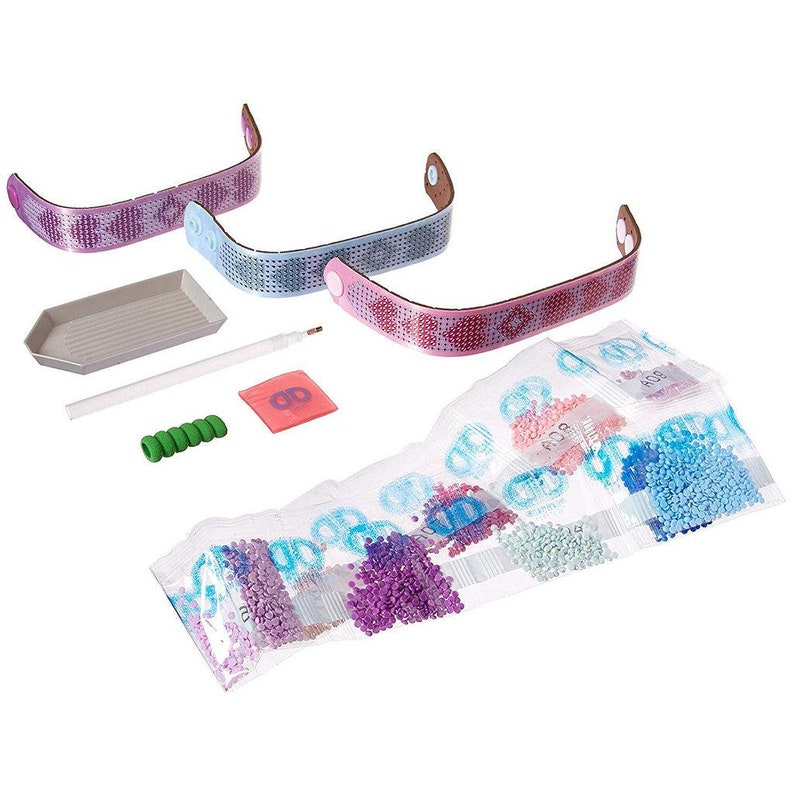 May include: A DIY diamond painting kit with three pink and blue bracelets, a tray, a tool, and a bag of colorful diamonds.