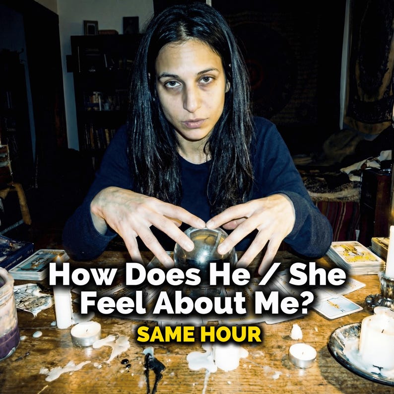 May include: A woman with long dark hair looks directly at the viewer, with a crystal ball in front of her. The text "How Does He / She Feel About Me?" and "SAME HOUR" are displayed on the table. Candles and tarot cards are also visible.