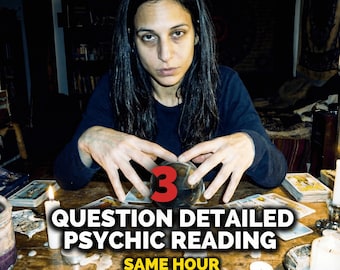 May include: A person with long dark hair and a dark blue shirt is holding a crystal ball with the number 3 in red. The text reads "3 QUESTION DETAILED PSYCHIC READING SAME HOUR". Tarot cards and candles are on the wooden table.