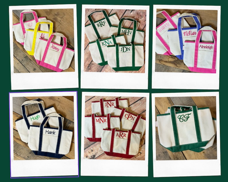 May include: Nine personalized canvas tote bags with green, red, blue, and yellow trim. The bags have various names embroidered on them, including 'Hugh', 'Hank', 'Abby', 'McNab', 'Ainsley', 'KNA', 'JDN', 'MHV', 'RRF', 'JNR', 'CPN', 'ARR', and 'C.F'.