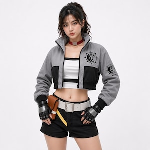 May include: A cropped gray and black jacket with a high collar and a circular emblem on the sleeves. The jacket is paired with black shorts, a white belt, and fingerless gloves. A small brown pouch is attached to the belt.