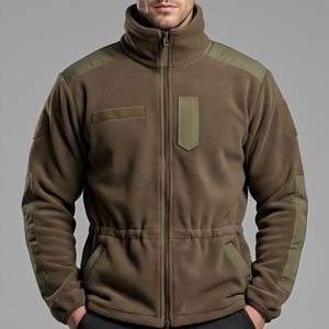 May include: A brown fleece jacket with a high collar and a full-length zipper. The jacket features olive green accents on the shoulders, elbows, and pockets. It has a drawstring waist and a small patch pocket on the chest.