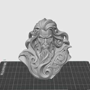 May include: A monochromatic gray 3D printed bust of a bearded figure with long flowing hair, featuring stylized avian motifs integrated into the design on both sides of the face, presented with a smooth finish and intricate sculpted details.