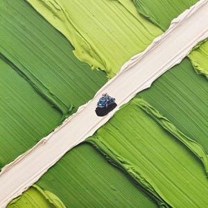 May include: A small blue car with a roof rack is positioned on a diagonal strip of thick, textured off-white paint that cuts across a background of layered, impasto-style green paint strokes in varying shades of lime, emerald, and forest green.