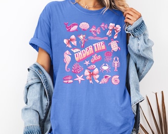 Sous la mer : T-shirt Coquette Coquillage et Vie Marine, Créatures des Profondeurs, Ambiance Été