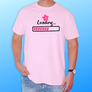 May include: A set of three ceramic mugs with a speckled, matte finish. The mugs are in shades of cream, light gray, and dark gray. Each mug has a simple, minimalist design, perfect for coffee or tea.