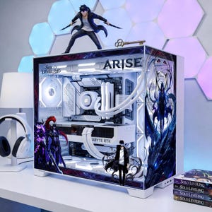 May include: A custom white computer case with "ARISE" text and "Solo Leveling" graphics. A figurine stands on top, with a key. The case has internal components and is decorated with anime-style art.