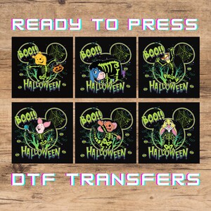 May include: Six black square DTF transfers featuring cartoon characters in skeleton costumes with the text BOO and HALLOWEEN. The designs include Winnie the Pooh, Eeyore, Tigger, Piglet, Roo, and Rabbit, all framed by a green Mickey Mouse head outline.