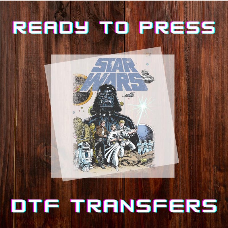 May include: A DTF transfer featuring a Star Wars graphic with Darth Vader, Luke Skywalker, and other characters. The words "READY TO PRESS" and "DTF TRANSFERS" are displayed in a colourful, retro font.
