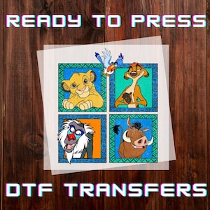 May include: DTF transfer sheet featuring four squares with characters from The Lion King. The characters include Simba, Timon, Pumbaa, and Rafiki. The words "READY TO PRESS" and "DTF TRANSFERS" are printed in a colorful, pixelated font.