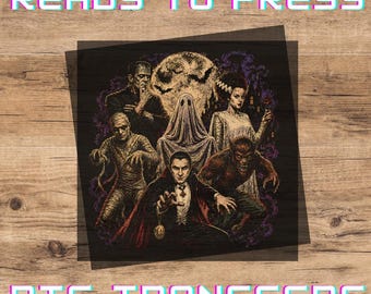 May include: A square DTF transfer sheet featuring a graphic illustration of classic horror movie monsters including Frankenstein, a mummy, a ghost, a vampire, a werewolf, and a bride figure against a full moon background with the text READY TO PRESS DTF TRANSFERS.